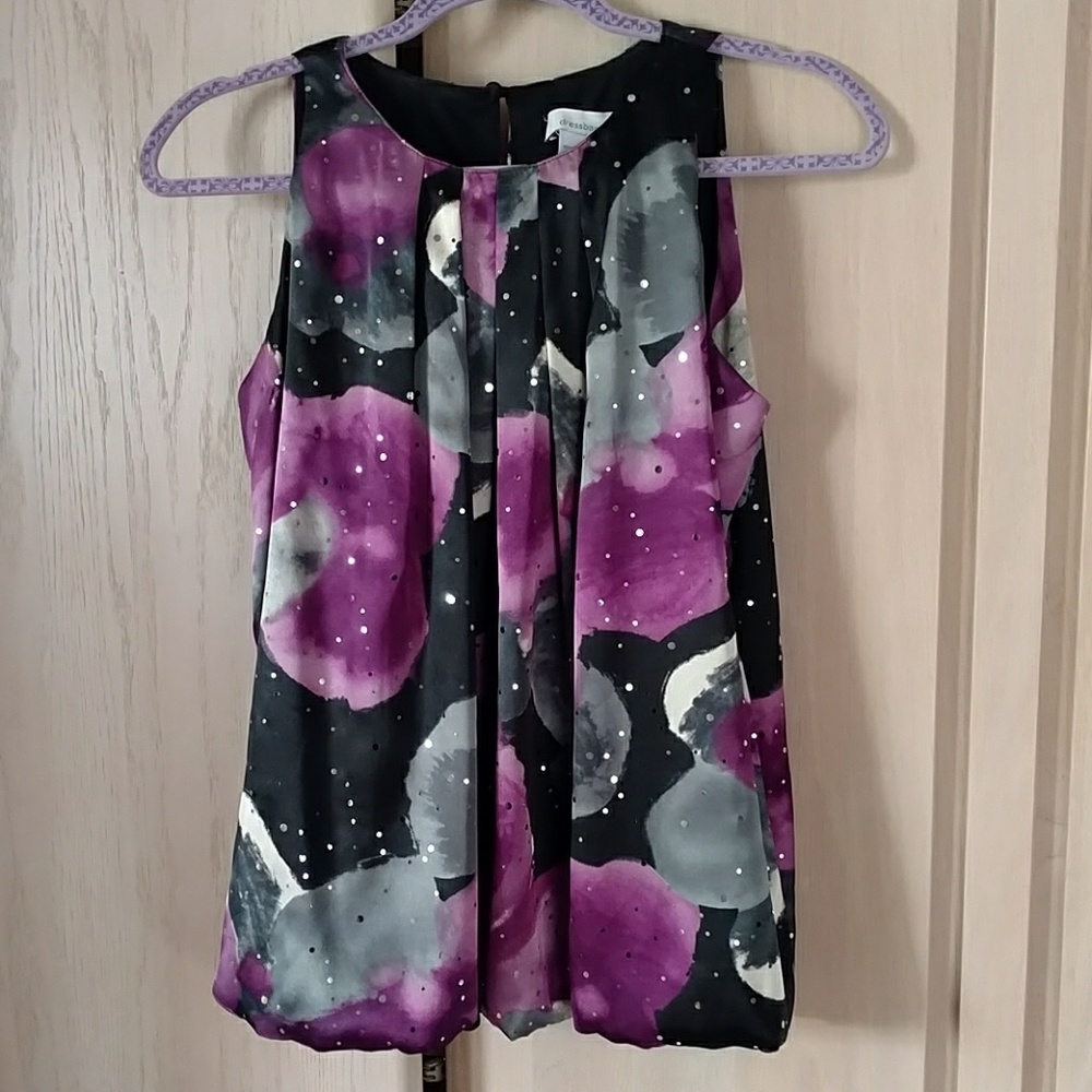 Sleeveless top with ballooned hem